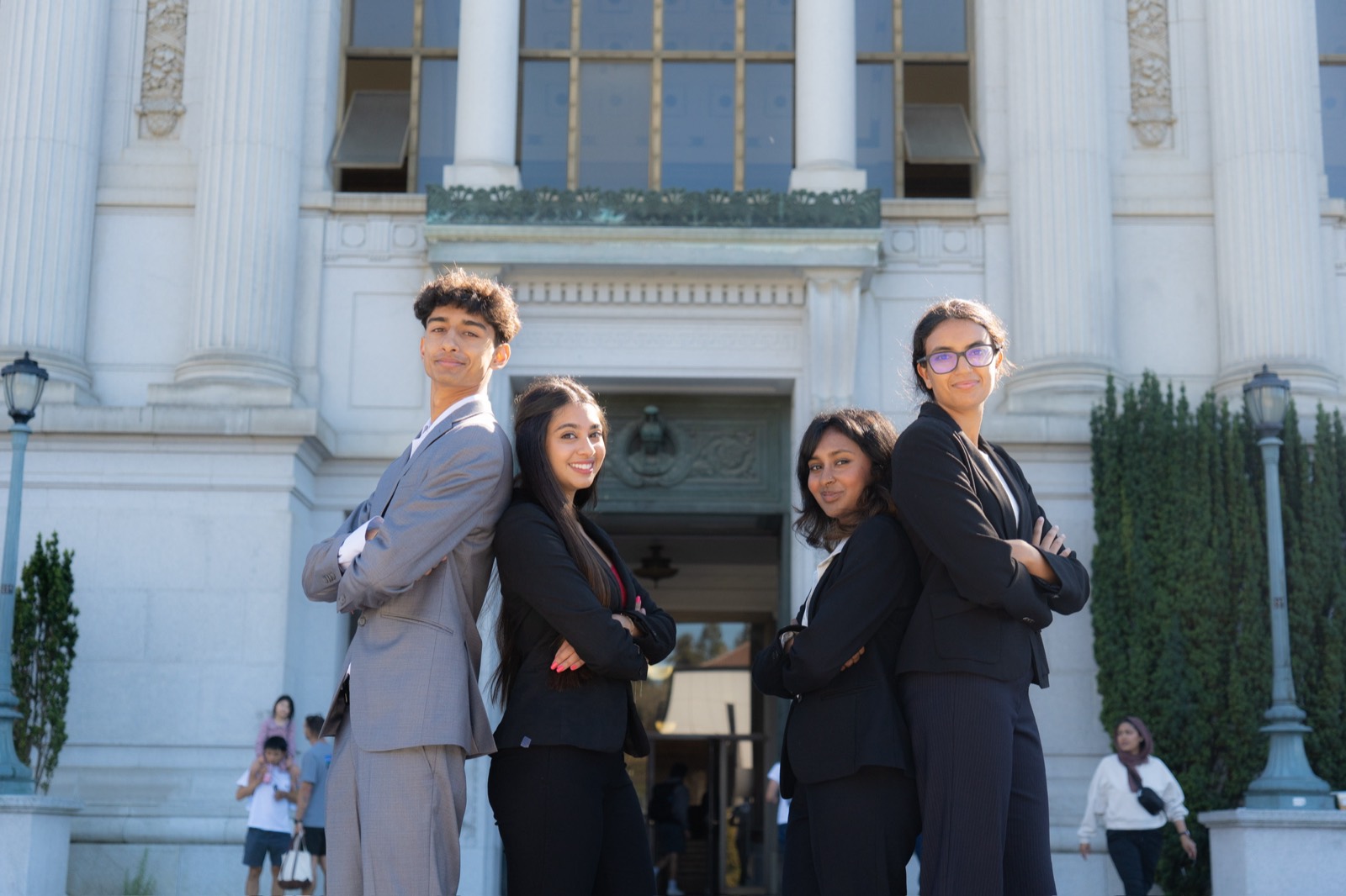 Asha Berkeley officers in front of Doe Library